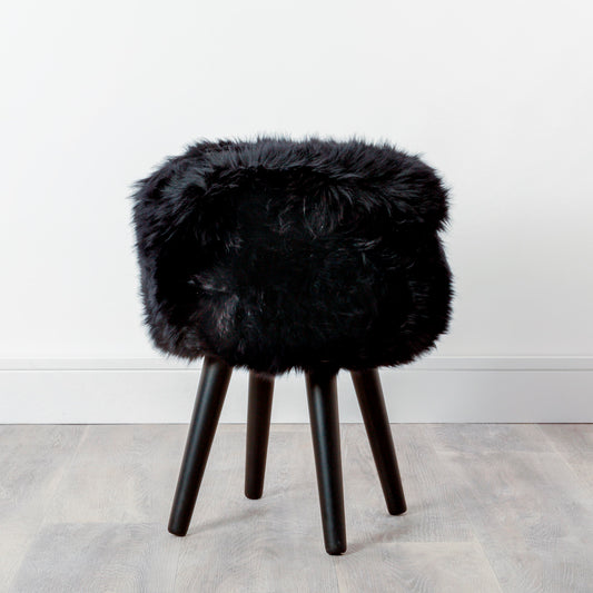 Black Sheepskin Stool with Black Wooden Legs