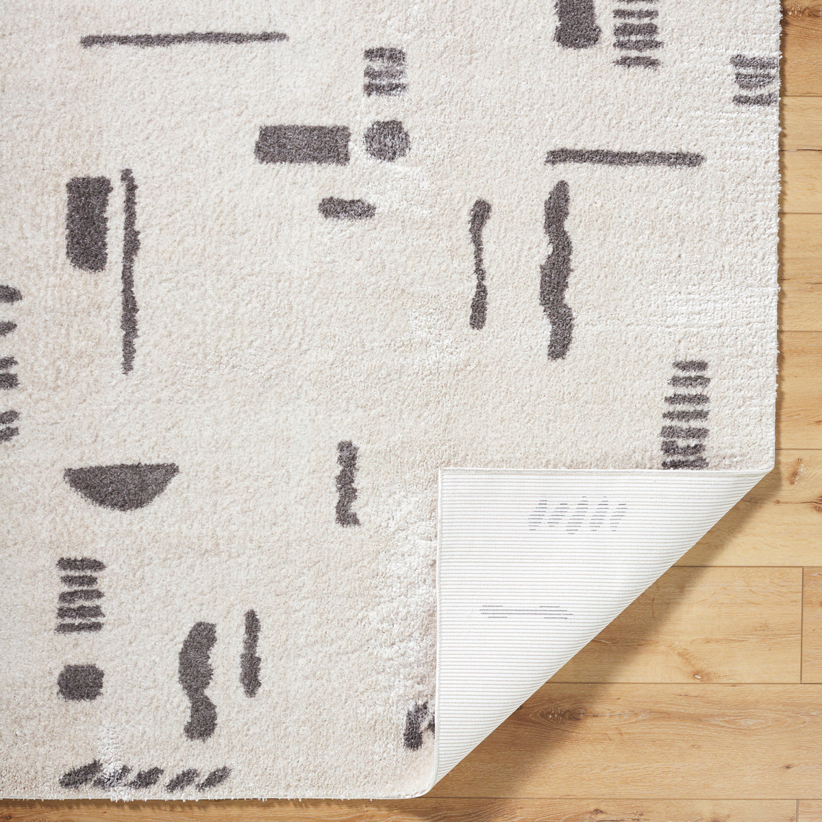 Fossay Cream and Grey Washable Tribal Shaggy Rug