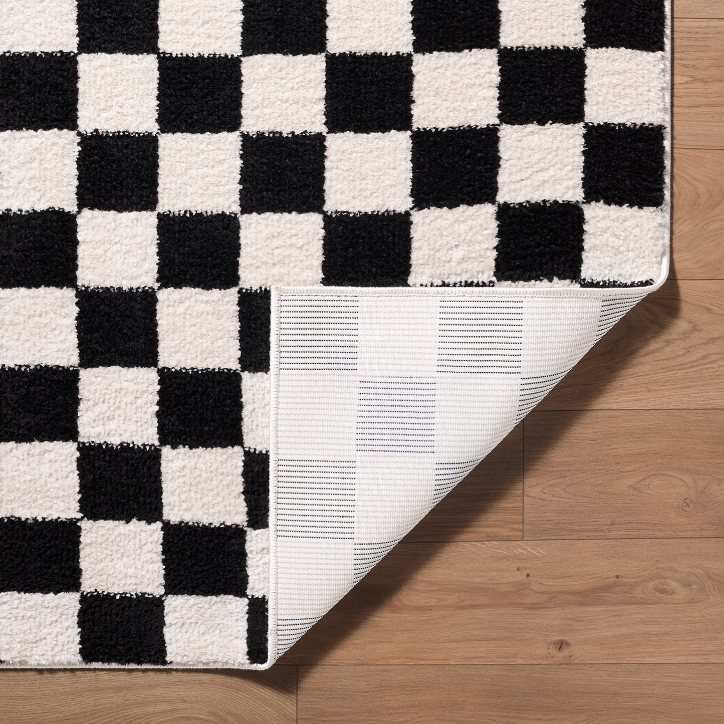 Fossay Black and Cream Washable Checkered Shaggy Rug